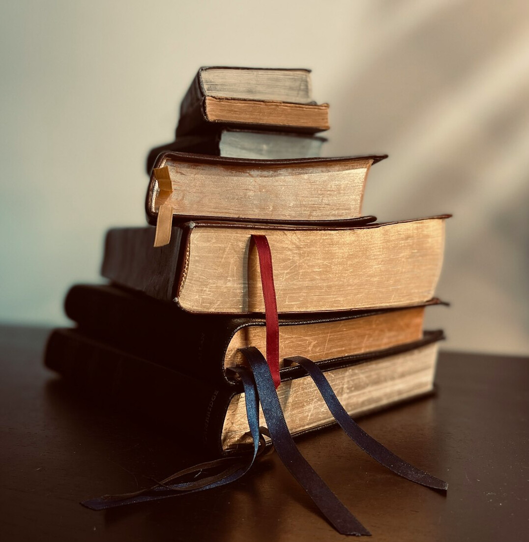 Stack of old books on a table