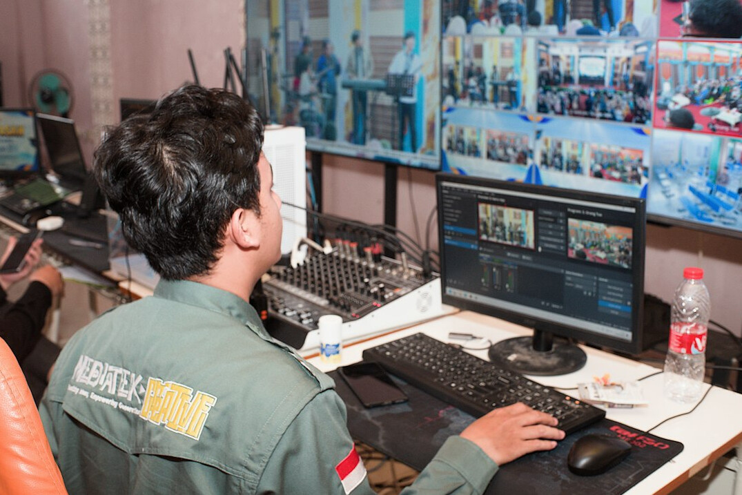 store security guard watching monitors