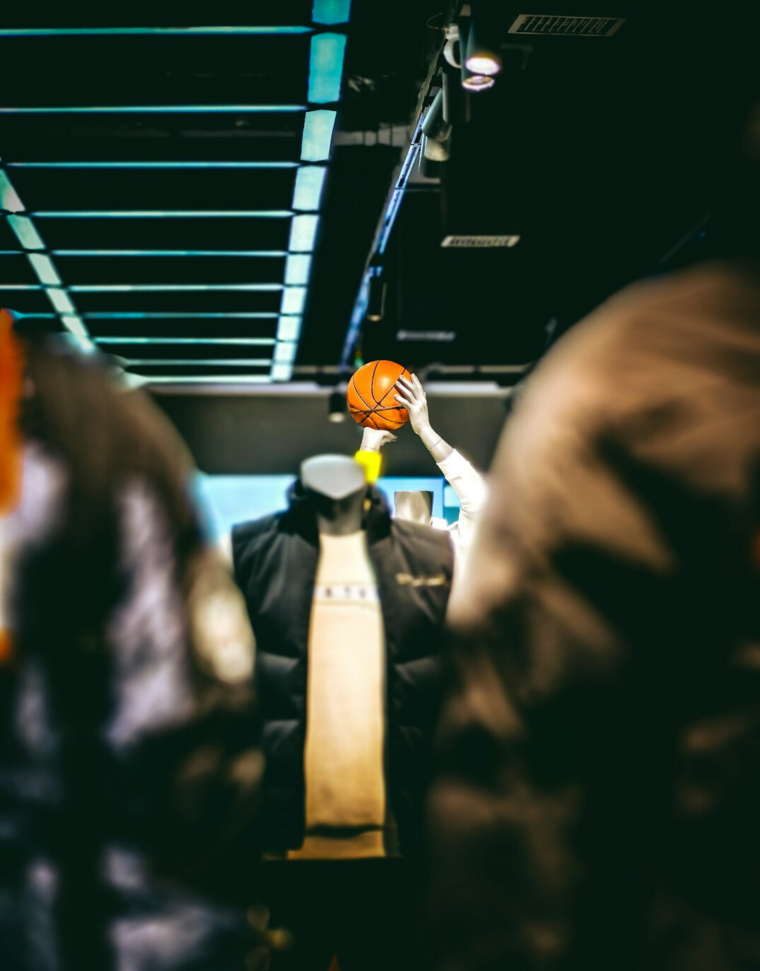 man hiding bottle in jacket